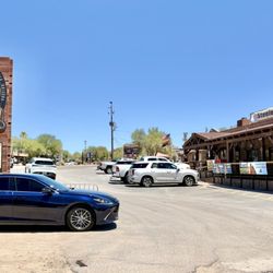 Harold's Corral - Exterior on Cave Creek Rd with minimal paved parking and lots of gravel parking