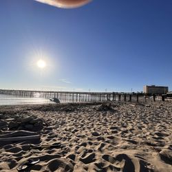 View of the pier from the left side beach