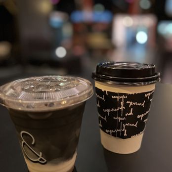 Ampersand - Black rose (left) and regular hot latte (right). Not a fan of the black rose. Latte is decent. Only to-go orders = no latte art - Coffee & Tea Near Me - Fort Worth, Texas