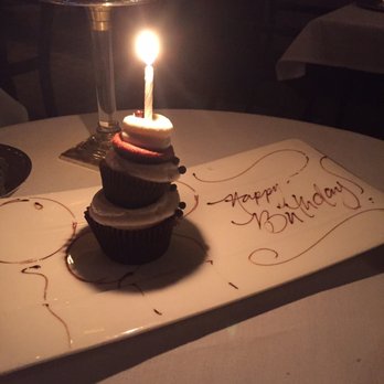 Bacchanalia - Happy birthday cupcake! - New American Near Me - Atlanta, Georgia Bacchanalia - Happy birthday cupcake! - New American Near Me - Atlanta, Georgia