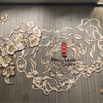 Maad Lamb Cuisine - a wall decoration with flowers - Chinese Near Me - Houston, Texas Maad Lamb Cuisine - a wall decoration with flowers - Chinese Near Me - Houston, Texas