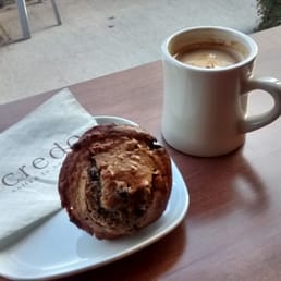 Delicious americano and blueberry muffin on a beautiful Saturday afternoon.
