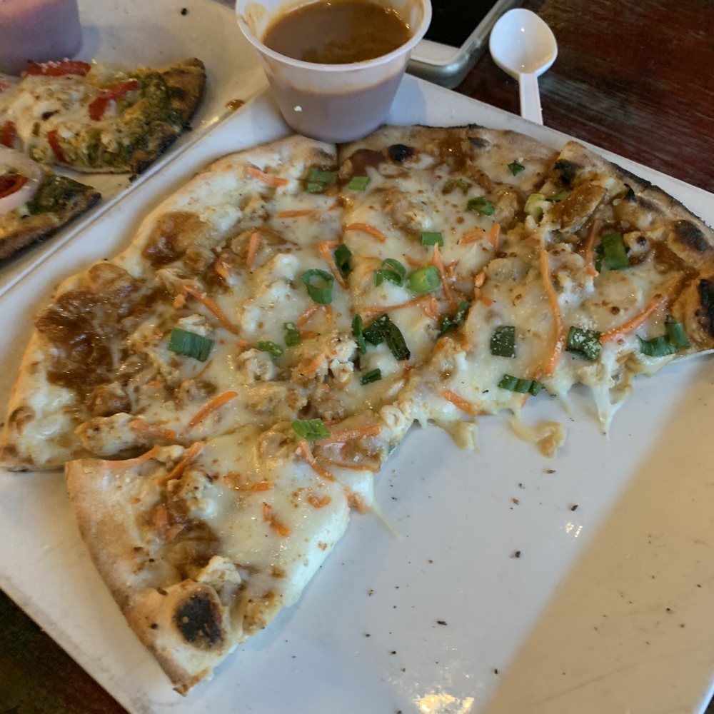 Paddle Hard Brewing - Thai chicken pizza with peanut sauce - Breweries Near Me - Grayling, Michigan