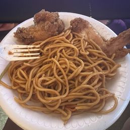 a plate of chicken and noodles a plate of chicken and noodles