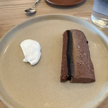 Arquet - 70% CHOCOLATE TERRINE hazelnut praline, vanilla bean chantilly cream - New American Near Me - San Francisco, California Arquet - 70% CHOCOLATE TERRINE hazelnut praline, vanilla bean chantilly cream - New American Near Me - San Francisco, California