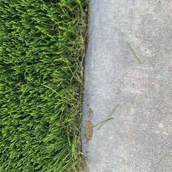 Elite Synthetic Turf - the edge of a sidewalk - Landscaping Near Me - Jupiter, Florida