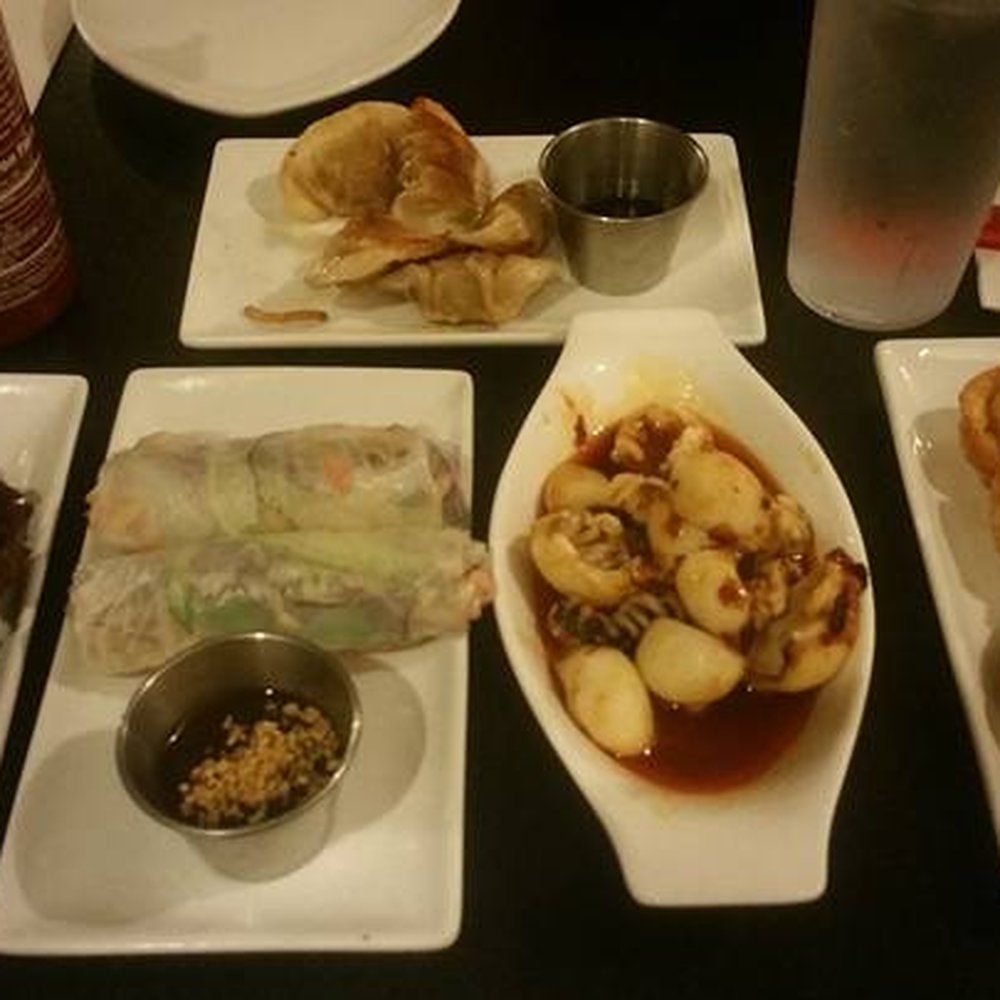Han Noodle Bar - Assortment of appetizers: cumin beef, shrimp spring rolls, cuttle fish (personal favorite), crab rangoon, and pan fried wontons in the back! - Chinese Near Me - Rochester, New York Han Noodle Bar - Assortment of appetizers: cumin beef, shrimp spring rolls, cuttle fish (personal favorite), crab rangoon, and pan fried wontons in the back! - Chinese Near Me - Rochester, New York