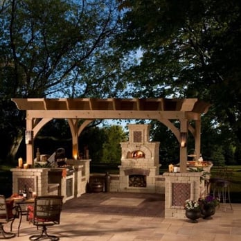 Heath Outdoor - an outdoor kitchen with a fireplace - Landscape Architects or Designers Near Me Heath Outdoor - an outdoor kitchen with a fireplace - Landscape Architects or Designers Near Me