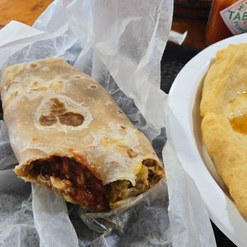 Meg's Place - I got so excited to try the green chile. I had to take a few bites before taking a picture. - Bakeries Near Me - Fort Thomas, Arizona