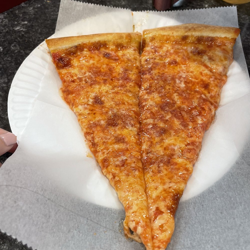 Lucia Pizza - Cheese slice - Pizza Near Me - Flushing, New York Lucia Pizza - Cheese slice - Pizza Near Me - Flushing, New York