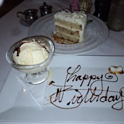 La Divina Italian Cafe - Italian Cream Cake, Vanilla ice-cream with chocolate sauce and extinguished ice cubes that were light instead of candle.