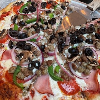 East St Pizzeria - Nice selection of toppings but the dog treat sausage and bland sauce spoiled the beautiful crust on this pie. - Pizza Near Me - Hutto, Texas East St Pizzeria - Nice selection of toppings but the dog treat sausage and bland sauce spoiled the beautiful crust on this pie. - Pizza Near Me - Hutto, Texas
