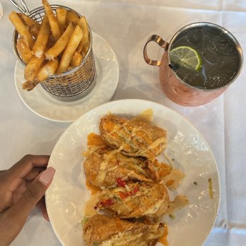 Papi Cuisine - Crabcake eggrolls, seasoned fries, mule - Cocktail Bars Near Me - Baltimore, Maryland Papi Cuisine - Crabcake eggrolls, seasoned fries, mule - Cocktail Bars Near Me - Baltimore, Maryland