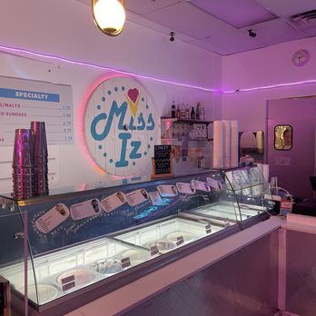 Miss Iz Ice Cream - Interior shop with the ice cream (a large variety with dirty sodas as well) - Ice Cream & Frozen Yogurt Near Me - Ramsey, Minnesota Miss Iz Ice Cream - Interior shop with the ice cream (a large variety with dirty sodas as well) - Ice Cream & Frozen Yogurt Near Me - Ramsey, Minnesota