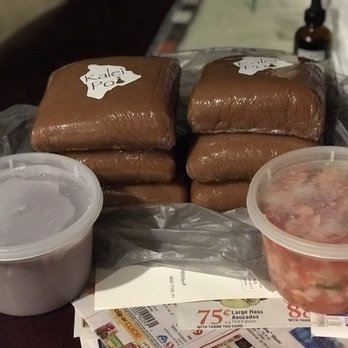 Kalei Poi - a variety of food items on a table - Food Delivery Services Near Me Kalei Poi - a variety of food items on a table - Food Delivery Services Near Me