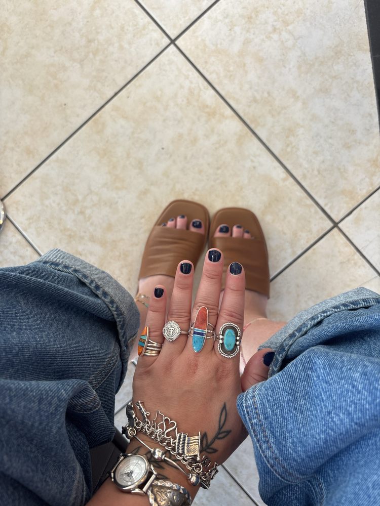 Couture Nails And Spa Logo