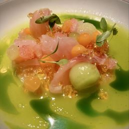 DRY-AGED AMBERJACK CRUDO SMOKED MELON, SERPENT CUCUMBER, MAKRUT LIME OIL DRY-AGED AMBERJACK CRUDO SMOKED MELON, SERPENT CUCUMBER, MAKRUT LIME OIL