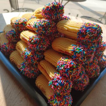 Papa Ganache - a plate of cookies with sprinkles - Bakeries Near Me - Matawan, New Jersey