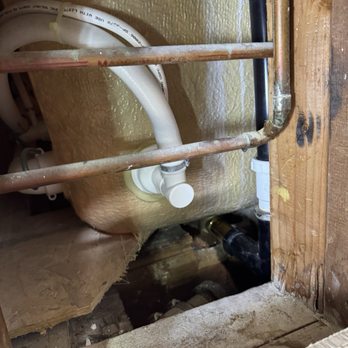 Chan Handyman - Tub drain access - Flooring Near Me Chan Handyman - Tub drain access - Flooring Near Me