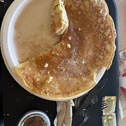 There is a plate under the pancake! There is a plate under the pancake!