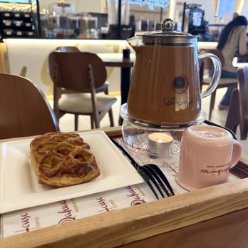 Qahwah House - Adeni Chai (black tea) plus tomato and olive pastry / on 2 June 2026 - Bakeries Near Me - North Olmsted, Ohio