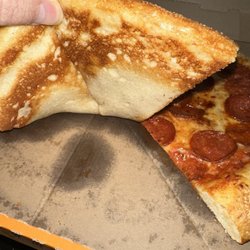 Uncooked pizza dough
