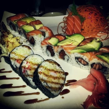 Plum House - North Pole Roll (9.95) Shrimp Tempura Roll (5.95) salmon sashini (2.25 each) - Japanese Near Me - Rochester, New York Plum House - North Pole Roll (9.95) Shrimp Tempura Roll (5.95) salmon sashini (2.25 each) - Japanese Near Me - Rochester, New York