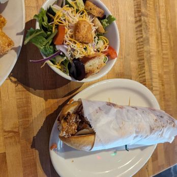 Tremont Tavern - Chicken Parmesan sandwich and salad side - Pubs Near Me - Chattanooga, Tennessee Tremont Tavern - Chicken Parmesan sandwich and salad side - Pubs Near Me - Chattanooga, Tennessee