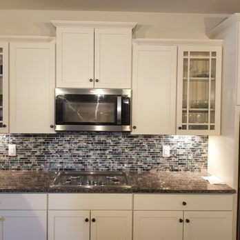 Heritage Contracting Renovations - Backsplash installed in the kitchen - Handyman Near Me
