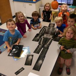 Covenant United Methodist Church Preschool - Students putting together an x-ray skeleton