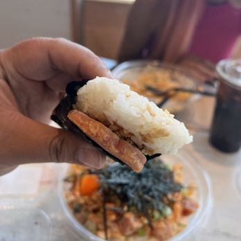 Pokeworks - a hand holding a piece of food - Hawaiian Near Me - El Paso, Texas Pokeworks - a hand holding a piece of food - Hawaiian Near Me - El Paso, Texas