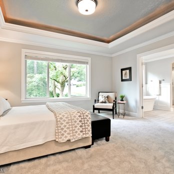Everett Custom Homes - Master suite with view of mature trees. - Real Estate Services Near Me - Portland, Oregon Everett Custom Homes - Master suite with view of mature trees. - Real Estate Services Near Me - Portland, Oregon