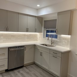 a kitchen with a sink and dishwasher