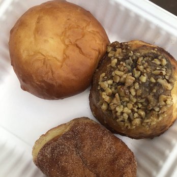 Kauai Bakery - Top: Kalua Manapua Right: Sticky Bun Bottom: Cinnamon Malasada - Bakeries Near Me - Lihue, Hawaii