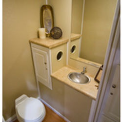 Jay's Septic Tank Services - Inside of portable toilet trailer by Jays Portables
