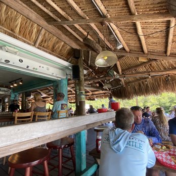 Geiger Key Marina - High top near the bar and tables near the water - Seafood Near Me - Key West, Florida