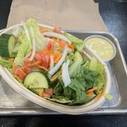 Small garden salad very fresh with avocado ranch dressing
