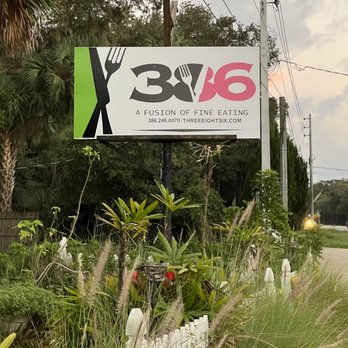 386 - a sign for a restaurant on the side of the road - Salad Near Me - Palm Coast, Florida