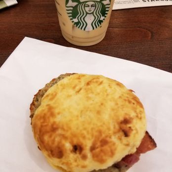 Starbucks - Chicken sausage and bacon biscuit with iced chai (really could have used some hot sauce for the biscuit sandwich) - Coffee & Tea Near Me - Tigard, Oregon Starbucks - Chicken sausage and bacon biscuit with iced chai (really could have used some hot sauce for the biscuit sandwich) - Coffee & Tea Near Me - Tigard, Oregon