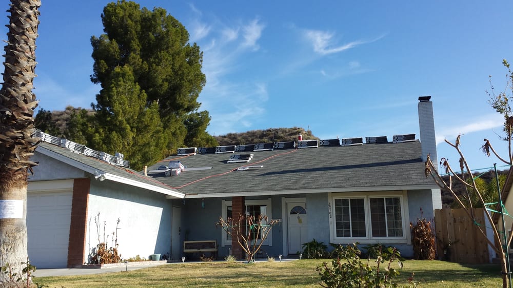 Slide of A. L. Follett Roofing