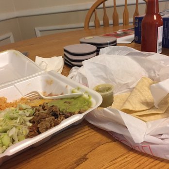 Los Mexican Burritos - two takeout containers of food - Mexican Near Me - Wichita, Kansas Los Mexican Burritos - two takeout containers of food - Mexican Near Me - Wichita, Kansas