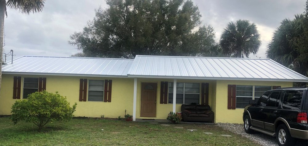 Slide of OCC Quality Roofing