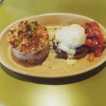 Snooze, an A.M. Eatery - Half order of chilaquiles benny (eggs benedict). It was... Okay. - Breakfast & Brunch Near Me - Tempe, Arizona Snooze, an A.M. Eatery - Half order of chilaquiles benny (eggs benedict). It was... Okay. - Breakfast & Brunch Near Me - Tempe, Arizona