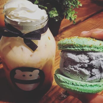 Mini Monster Cafe - Thai Tea in reusable mason jar and Pistachio Macroon with Taro ice cream - Ice Cream & Frozen Yogurt Near Me - Long Beach, California Mini Monster Cafe - Thai Tea in reusable mason jar and Pistachio Macroon with Taro ice cream - Ice Cream & Frozen Yogurt Near Me - Long Beach, California