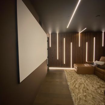 Blend Technology - This theater was a full build that included covering windows with drywall, handmade acoustic treatments, acoustic wall fabric, and RGB light - Home Theatre Installation Near Me - Agoura Hills, California Blend Technology - This theater was a full build that included covering windows with drywall, handmade acoustic treatments, acoustic wall fabric, and RGB light - Home Theatre Installation Near Me - Agoura Hills, California