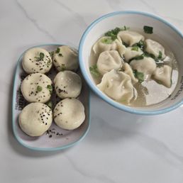 Pan fried dumpling, pork and cabbage dumpling in soup Pan fried dumpling, pork and cabbage dumpling in soup