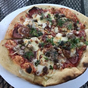 Roost Beer Garden - Salami, pancetta, and sausage pizza - Pizza Near Me - Pittsboro, North Carolina Roost Beer Garden - Salami, pancetta, and sausage pizza - Pizza Near Me - Pittsboro, North Carolina