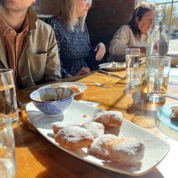 Homemade beignets and caramel sauce