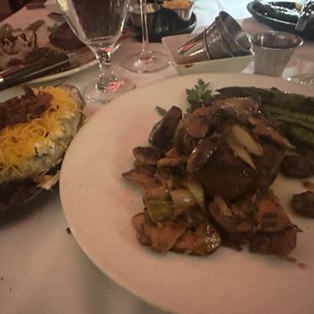 Jeff Ruby's Steakhouse - Lexington - Large Barrel-Cut Filet Mignon with charred asparagus and sides of mushrooms and loaded baked potato. - Steakhouses Near Me - Lexington, Kentucky Jeff Ruby's Steakhouse - Lexington - Large Barrel-Cut Filet Mignon with charred asparagus and sides of mushrooms and loaded baked potato. - Steakhouses Near Me - Lexington, Kentucky