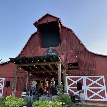 Arrington Vineyards - a red barn with a band playing outside - Wine Tasting Room Near Me - Arrington, Tennessee